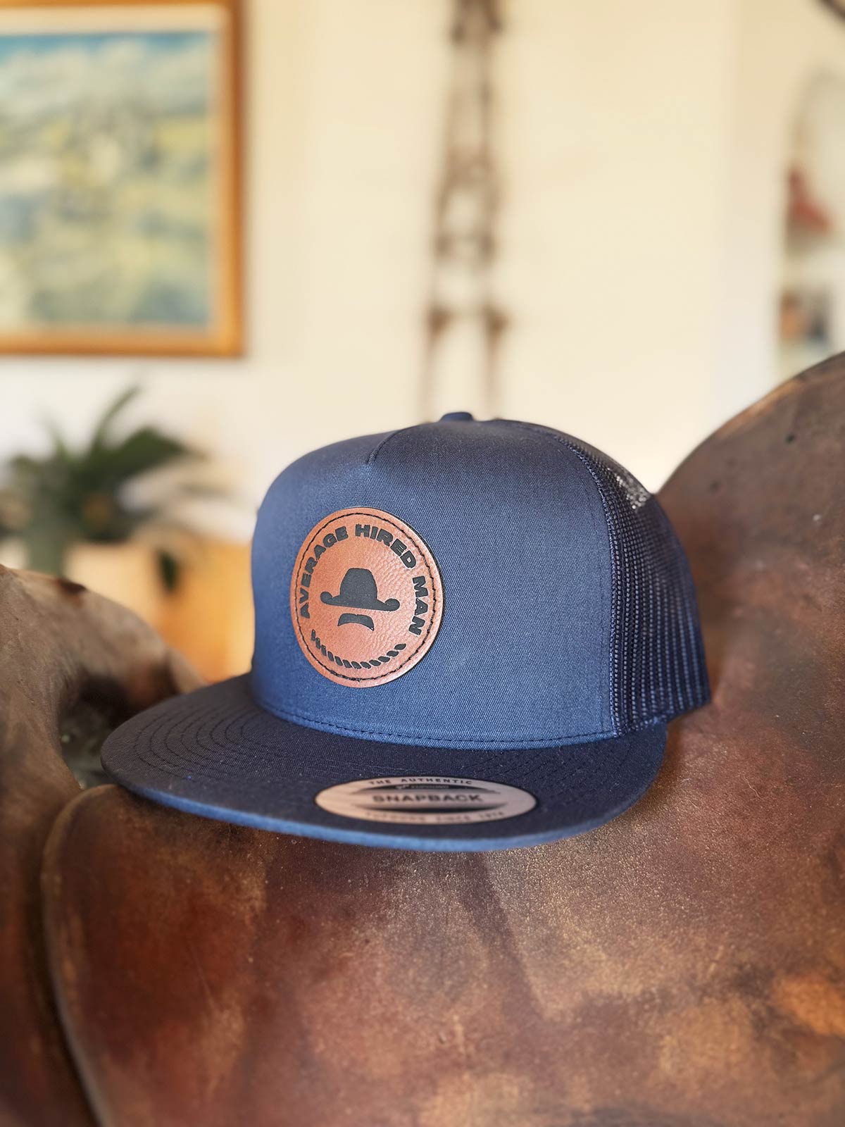 Navy Leather Patch Logo Yupoong Classic Trucker Cap